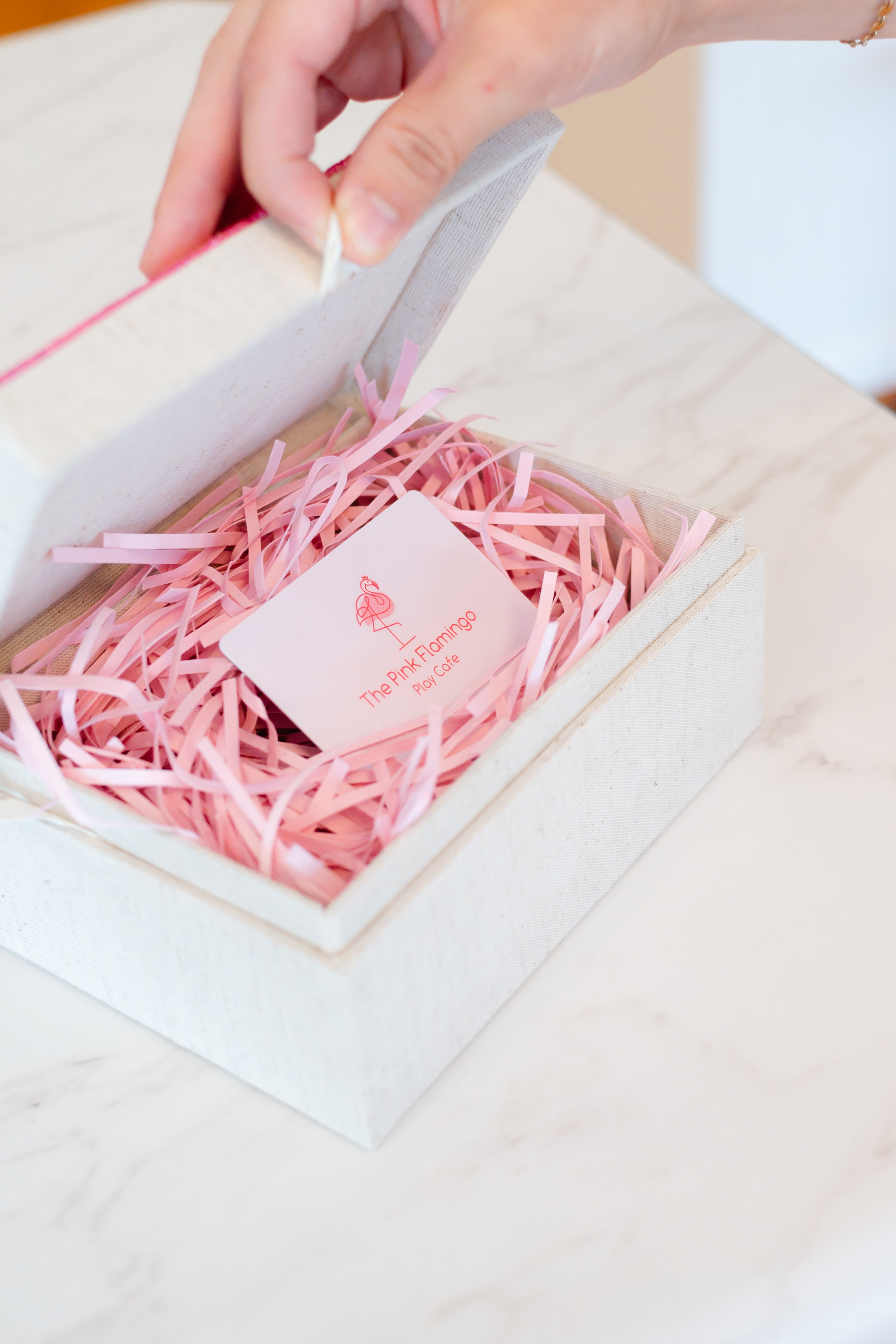 A pink gift card for The Mingo