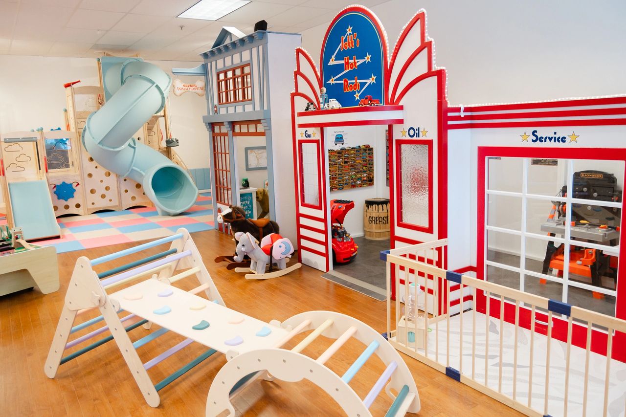 Children having fun in a colorful ball pit